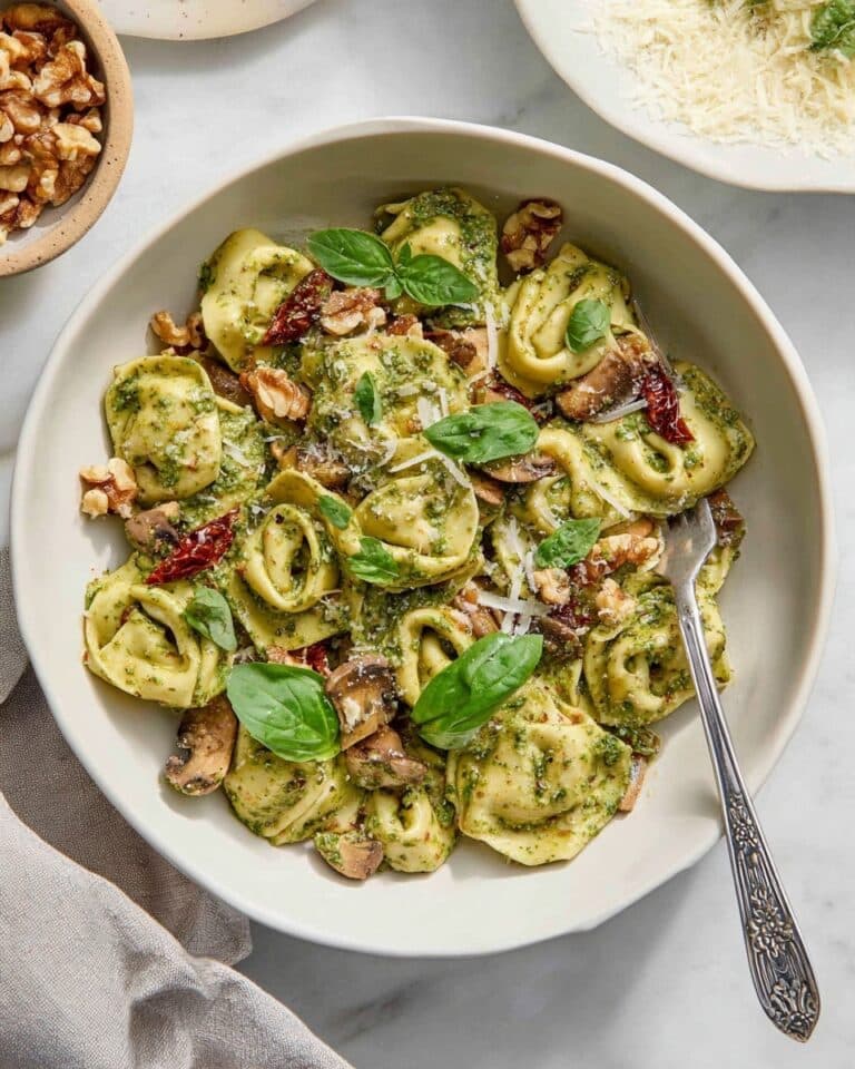 Creamy Pesto Tortellini with Toasted Walnuts and Sun-Dried Tomatoes Recipe
